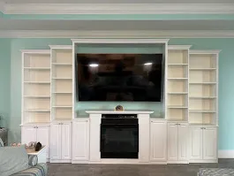 Contemporary entertainment wall custom finishes — custom storage designed and installed by Dream Closets in Longboat Key, FL