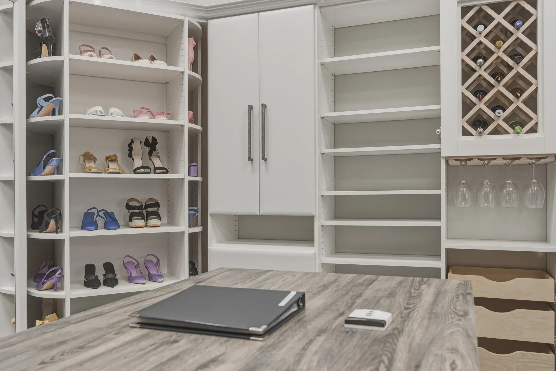Dream closets showroom closet island shoe storage — custom storage designed and installed by Dream Closets in Bradenton, FL