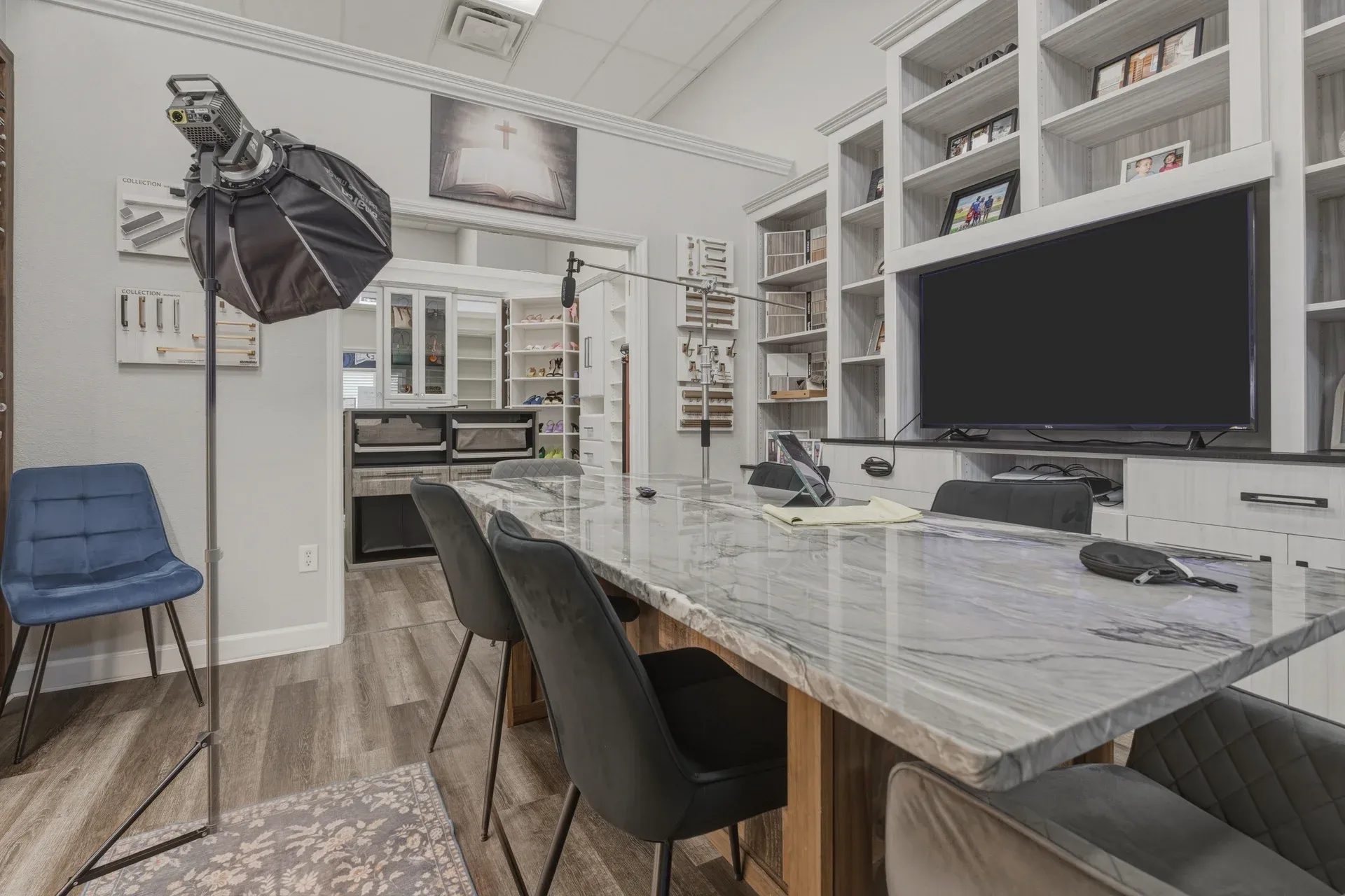 Design consultation room with a finish sample wall at the Dream Closets showroom