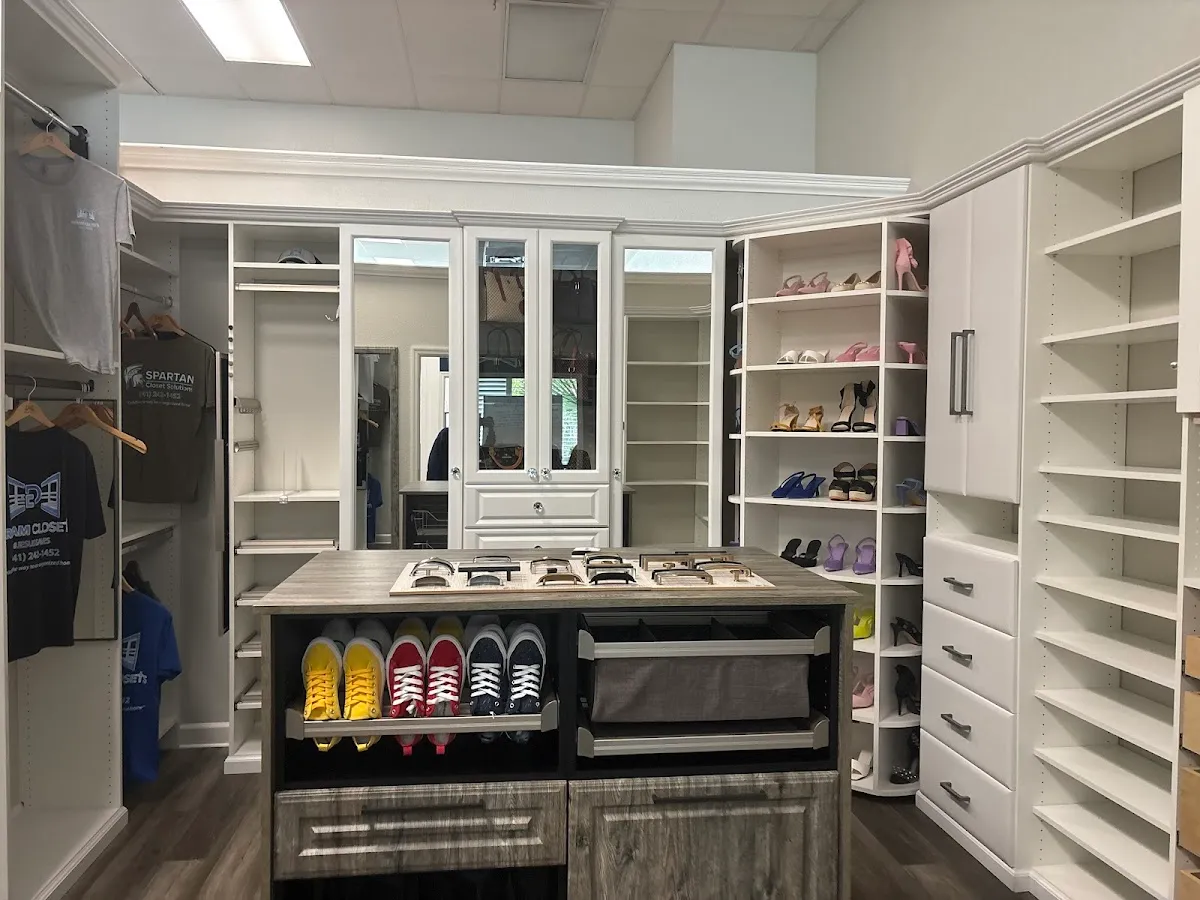 Luxury walk in closet island — custom storage designed and installed by Dream Closets in Sarasota, FL