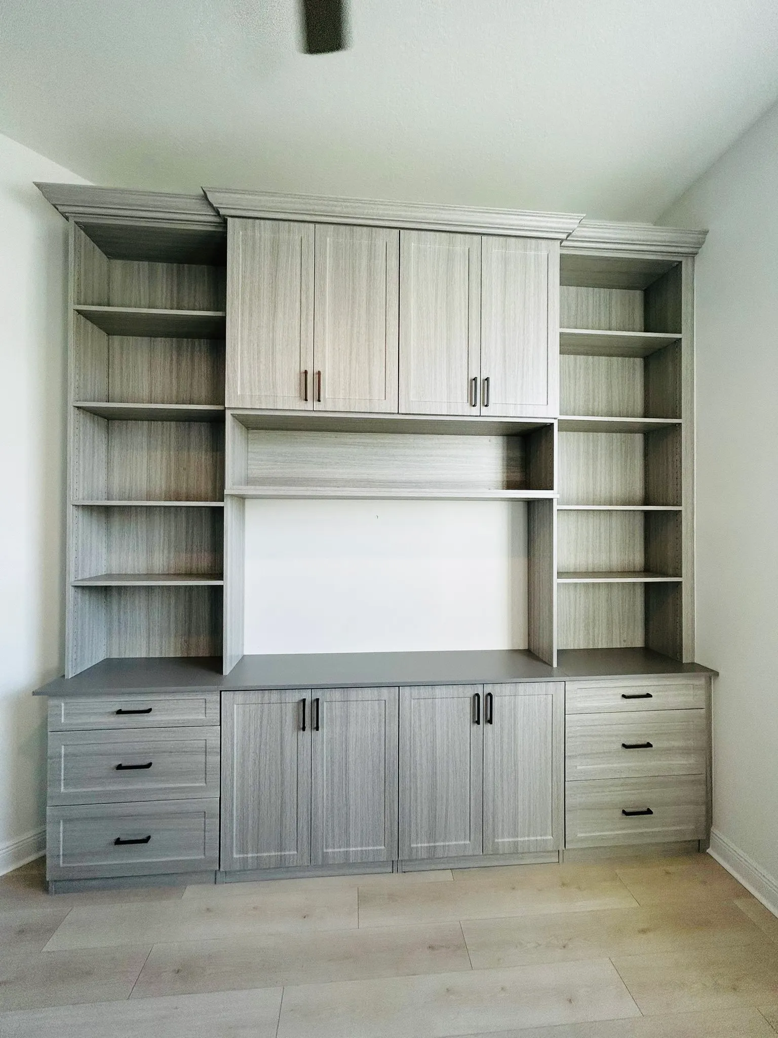 Walk in closet custom organizer — custom storage designed and installed by Dream Closets in Sarasota, FL