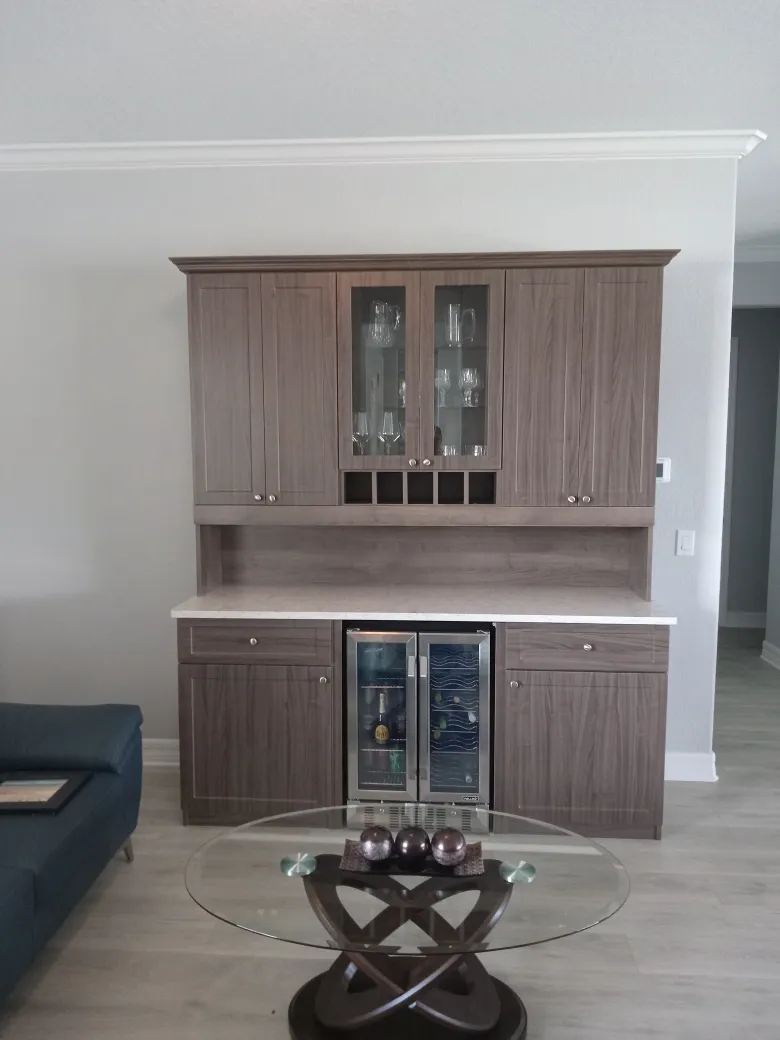 Walk in closet installation — custom storage designed and installed by Dream Closets in Longboat Key, FL